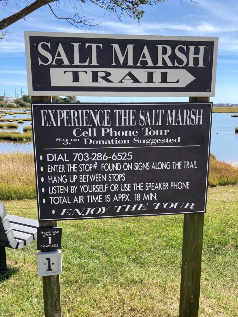 The salt marsh trail sign with information on how to do the audio tour.