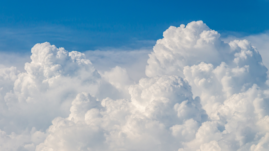 Clouds mushrooming to illustrate how clouds form fractal patterns.